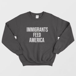 Jose Andres wears Immigrants Feed America Sweatshirt